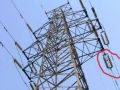 高压电的铁塔离导线那么近为什么不放电？