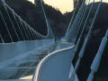 量身打造 桥景合一——组合功能异形玻璃桥面悬索桥建设新思路