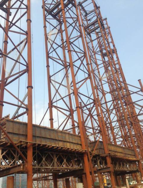 外倾式非对称钢拱肋提升安装新技术研究