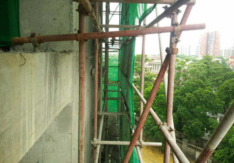 工具式一字型斜杆支座卸荷三角桁架施工工法