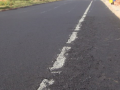 沥青混凝土道路路缘石超前预留置换施工工法