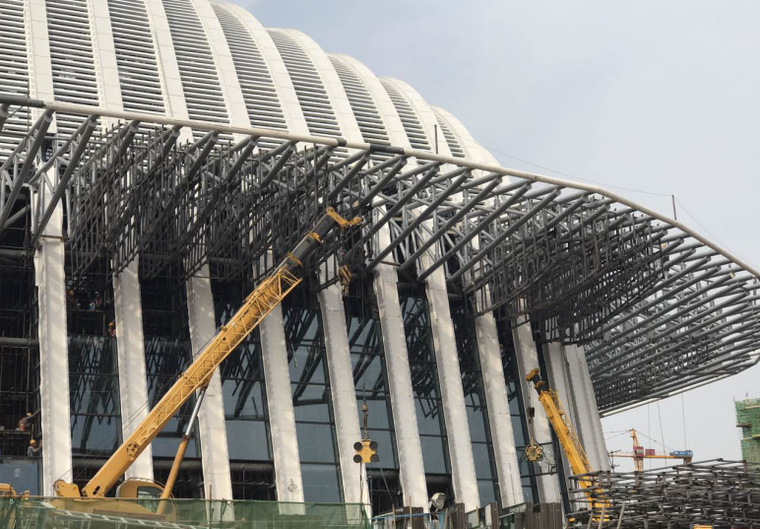 [广西]变角度渐进式折线单元式幕墙施工工法