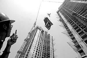 居民住宅楼6层资料下载-北京最高住宅楼封顶 “双子座”格局共33层