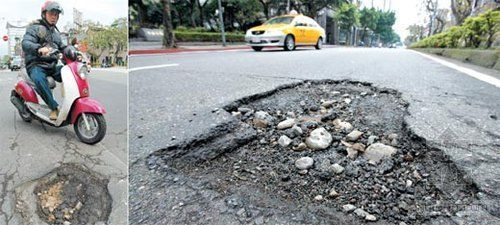 道路路缘石路平石施工资料下载-台北雨势不断 道路出现378个坑洞