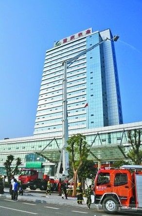 上海外立面建筑改造资料下载-上海火灾警示 主城建筑外墙改造急查隐患
