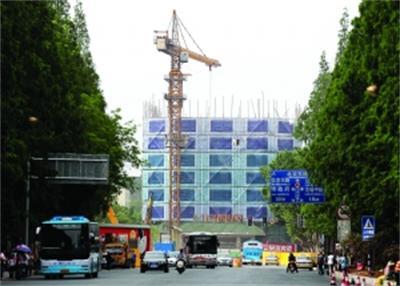 屋面防水保温改造资料下载-南京政府大楼被削顶改造 因破坏城市天际线