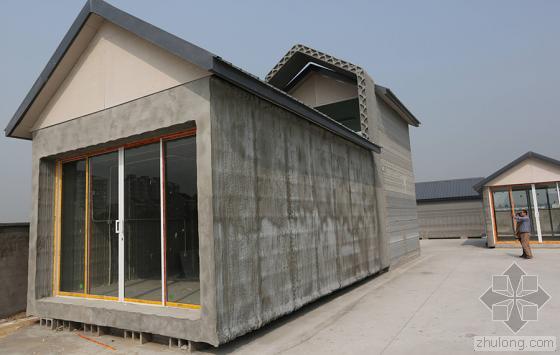 两层砖瓦结构资料下载-首批3D打印房屋落户上海 24小时造10幢房