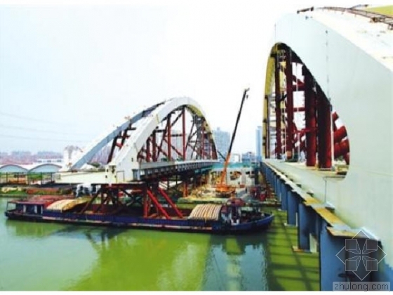 小跨度系杆拱桥资料下载-中国最大跨度钢箱系杆拱桥“浮拖法”施工成功