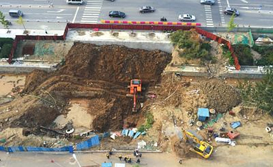 消防中队建筑施工图资料下载-建筑工地塌陷 一名工人被埋身亡