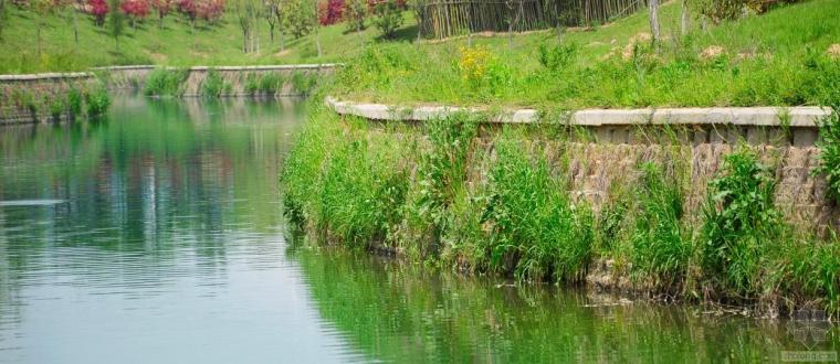 河道挡墙基础图片资料下载-河道驳岸自嵌式植生挡土墙施工资料