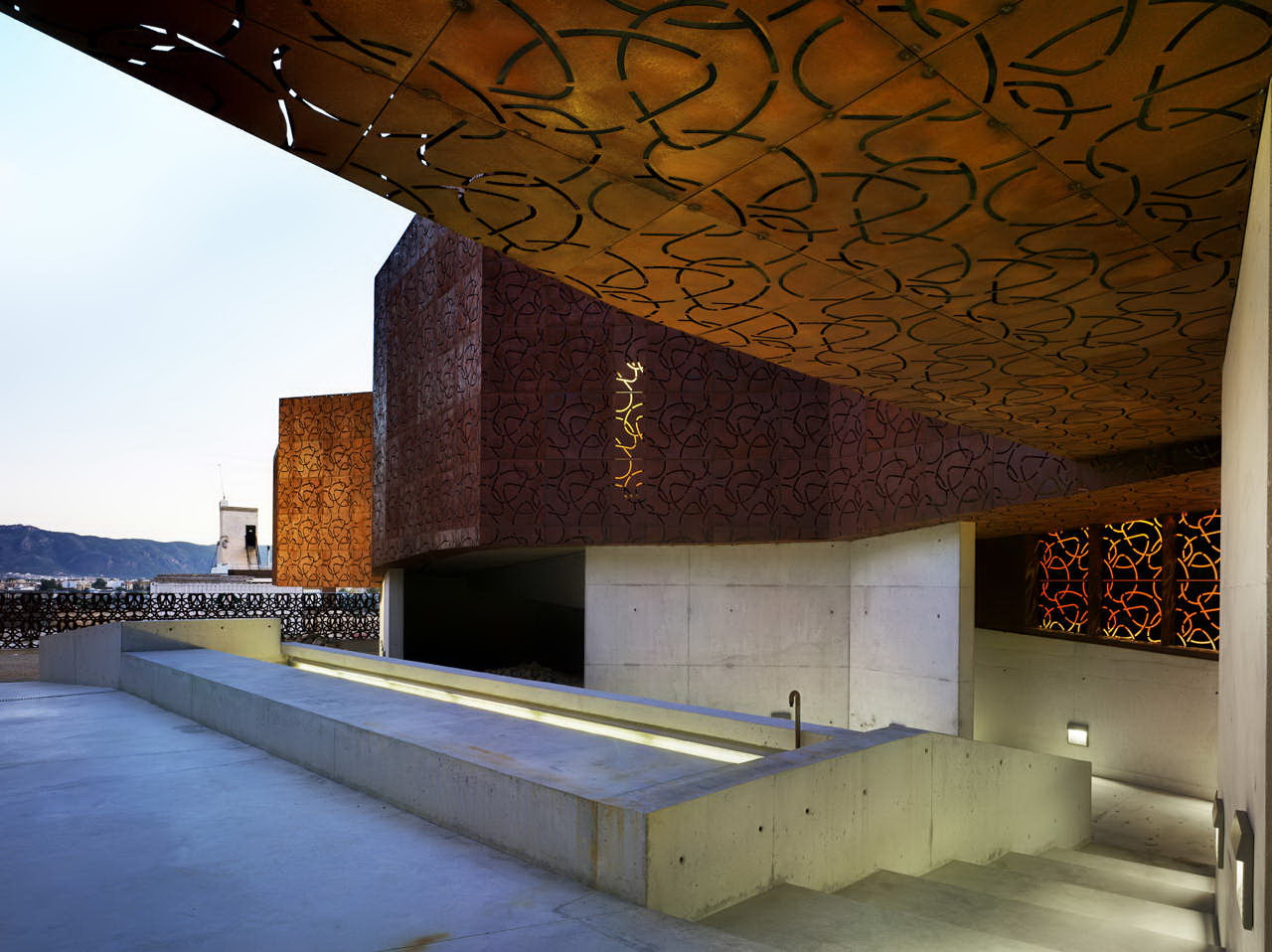 the building is situated on the south side of the hill of monte