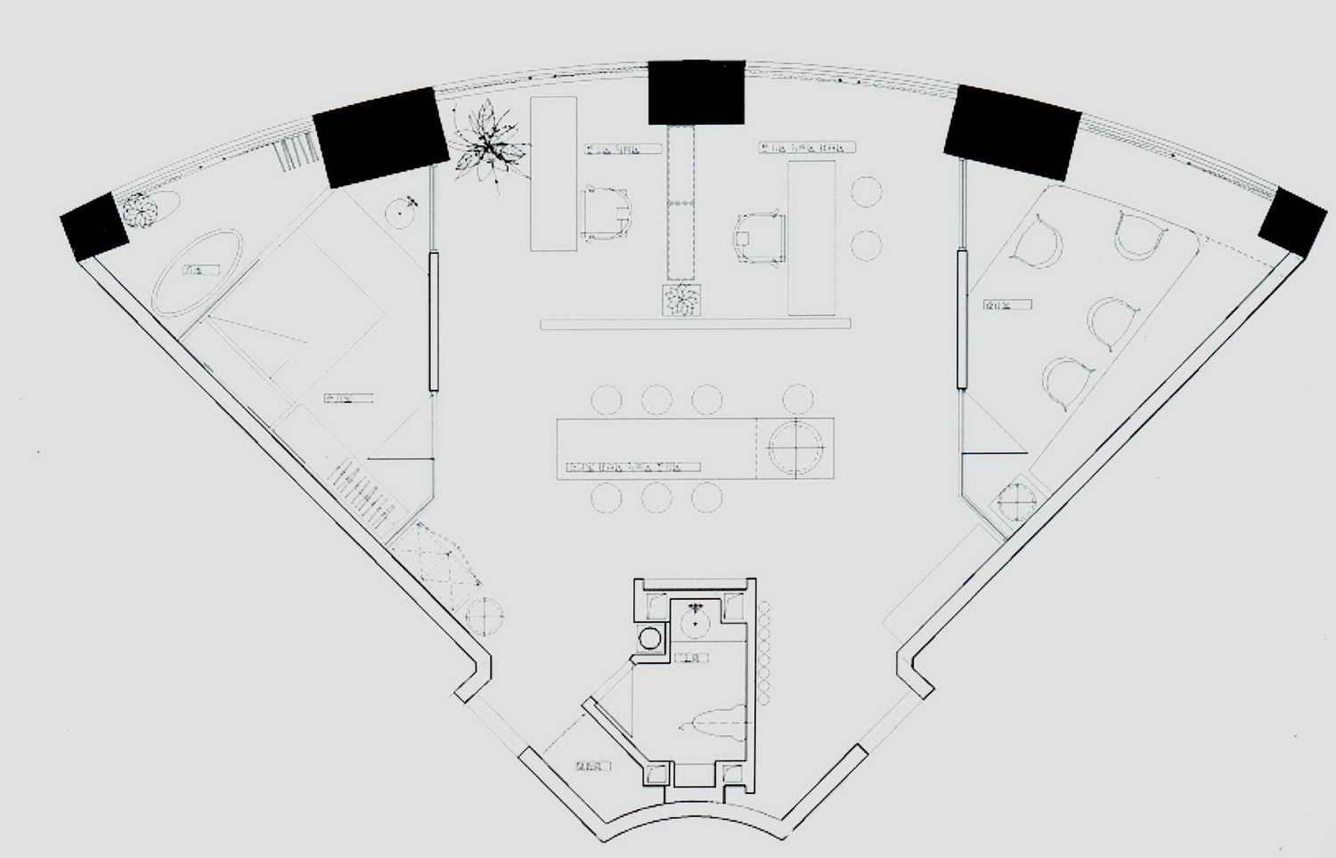设计师将这个空间分为三个部分,扇形的两边是两个小办公室,正中则是一