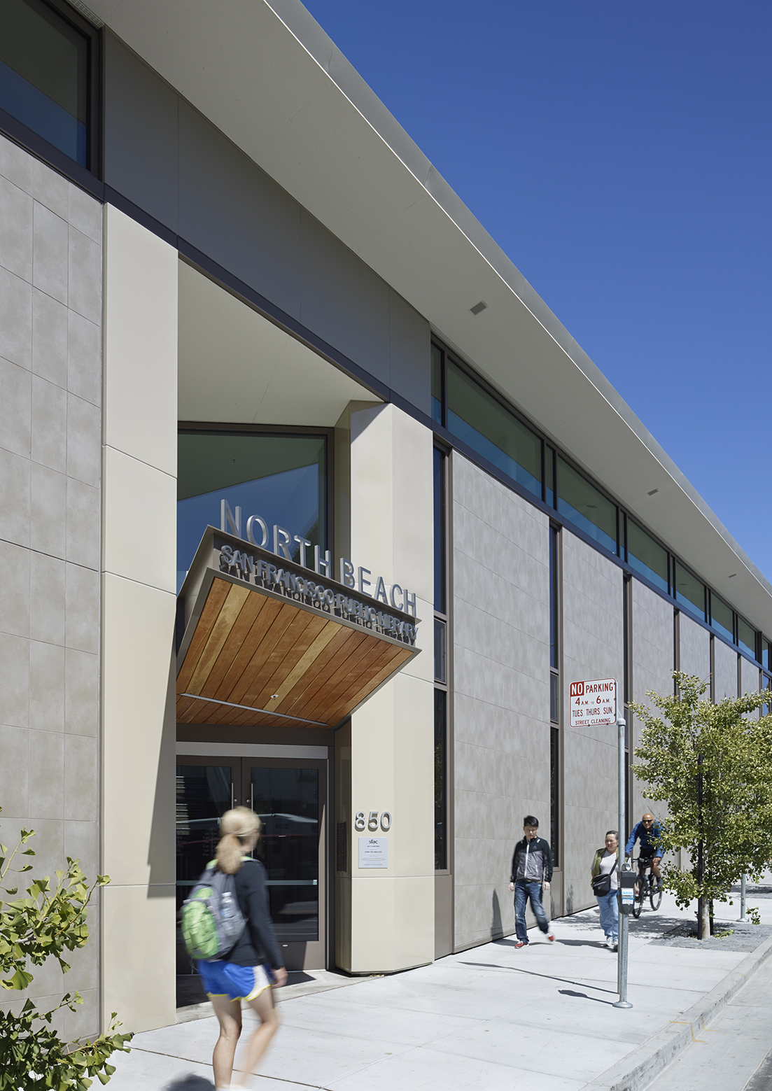 built on a former triangle parking lot, the two