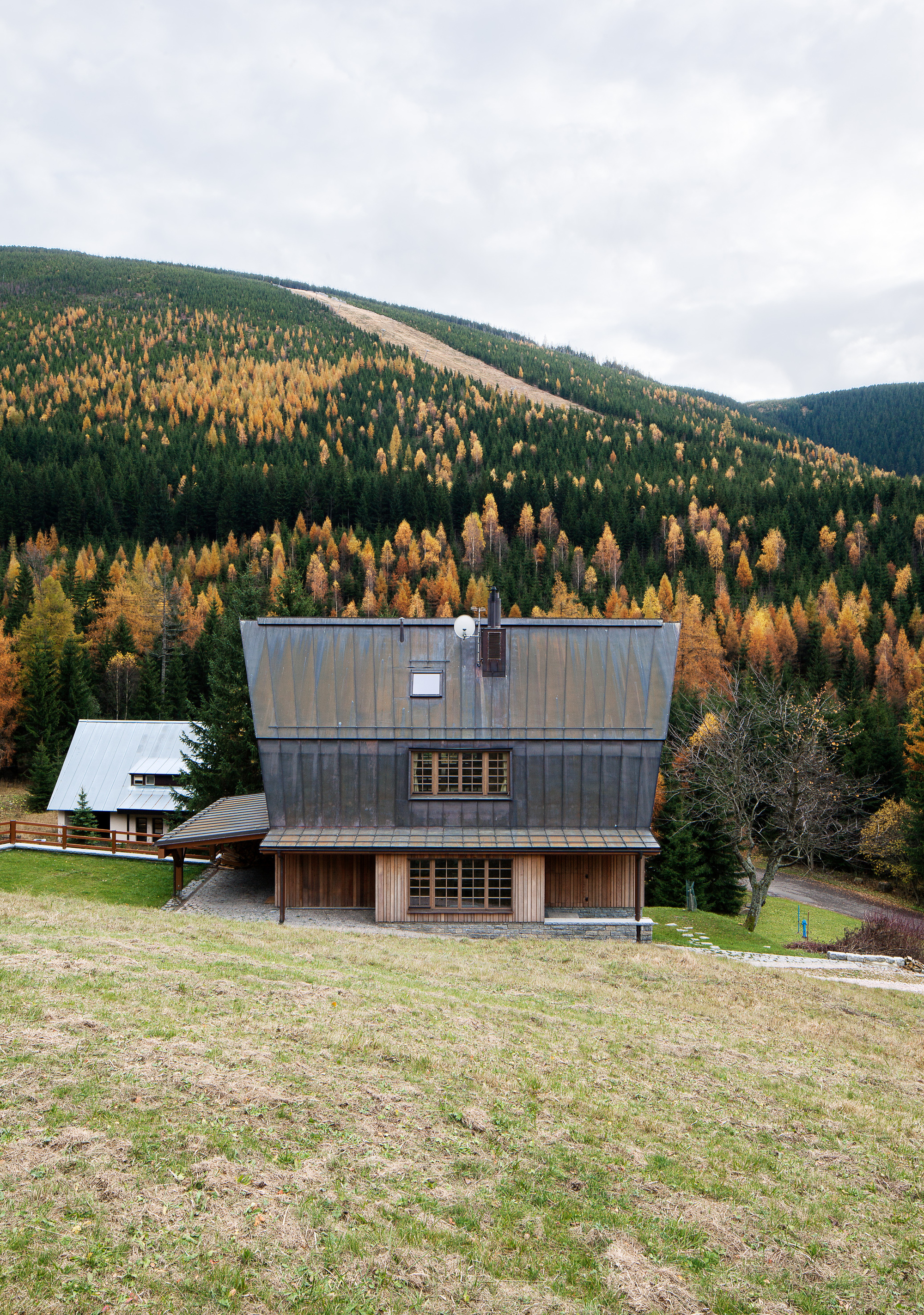 to design a new mountain chalet to replace existing dilapidated