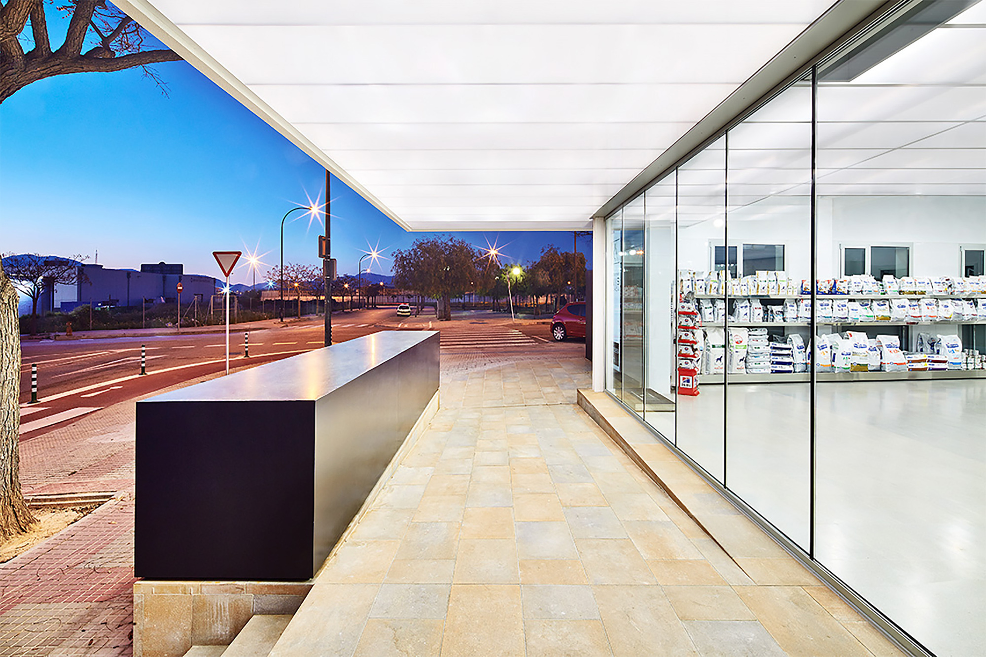 between and industrial and a residential area, adjoining the