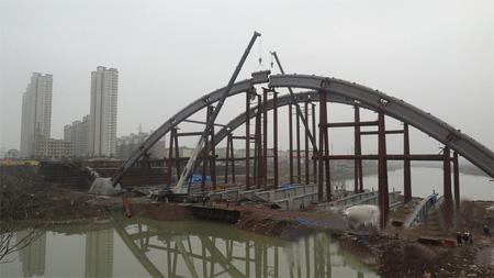 飞燕式拱桥的设计要求资料下载-60+180+60m飞燕式提篮钢管砼拱桥钢管混凝土泵送施工方案