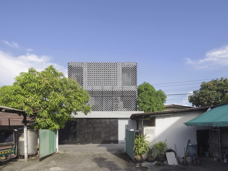 泰国小住宅资料下载-泰国镂空混凝土砖住宅