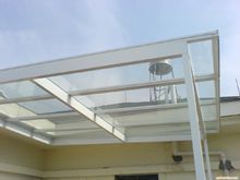 玻璃雨棚施工安装资料下载-玻璃雨棚