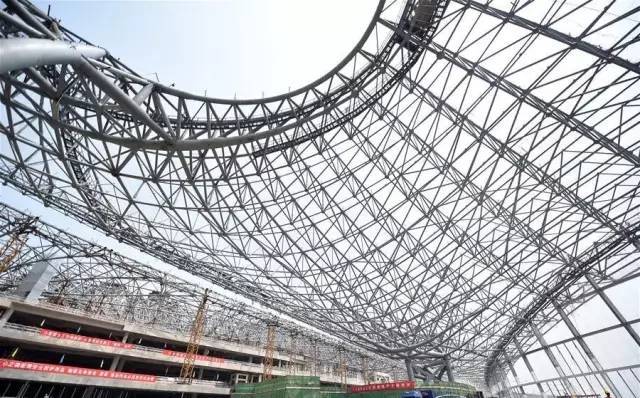 北京新机场航站楼钢结构封顶，高空俯瞰“雪花”全貌_3