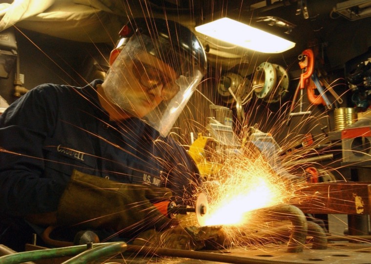 我国工程价格形式改革探讨-construction-worker-metal-grinder-labor-build-job.jpg