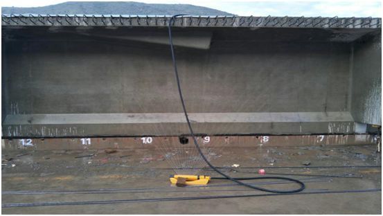 混凝土养护喷淋资料下载-改进施工工艺，提高T梁养护质量