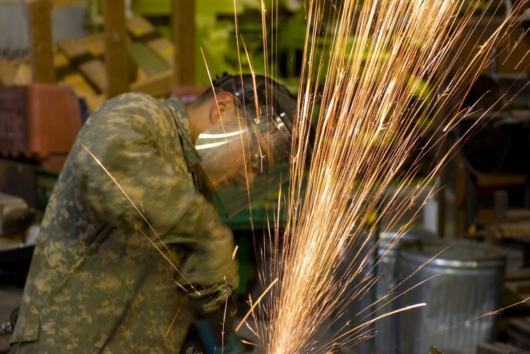 施工企业工程项目责任成本管理-construction-worker-metal-grinder-labor-build-job-1 (1).jpg