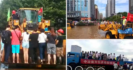 内涝治理施工资料下载-武汉暴雨后内涝严重 铲车卡车成“班车”