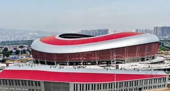 弧形玻璃su资料下载-大型体育场馆弧形结构施工技术申报总结